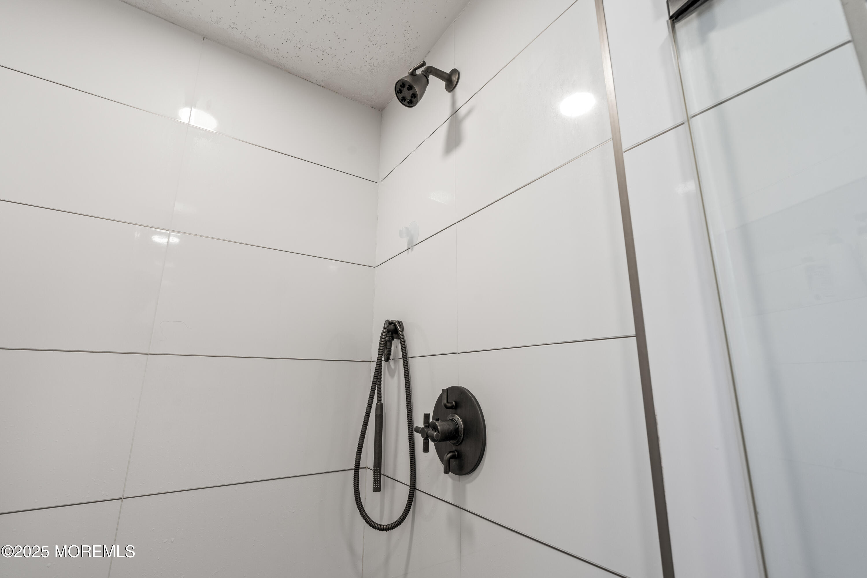 460 Runyan Avenue Deal, NJ 07723 - Photo 20 of 30 a bathroom with a shower