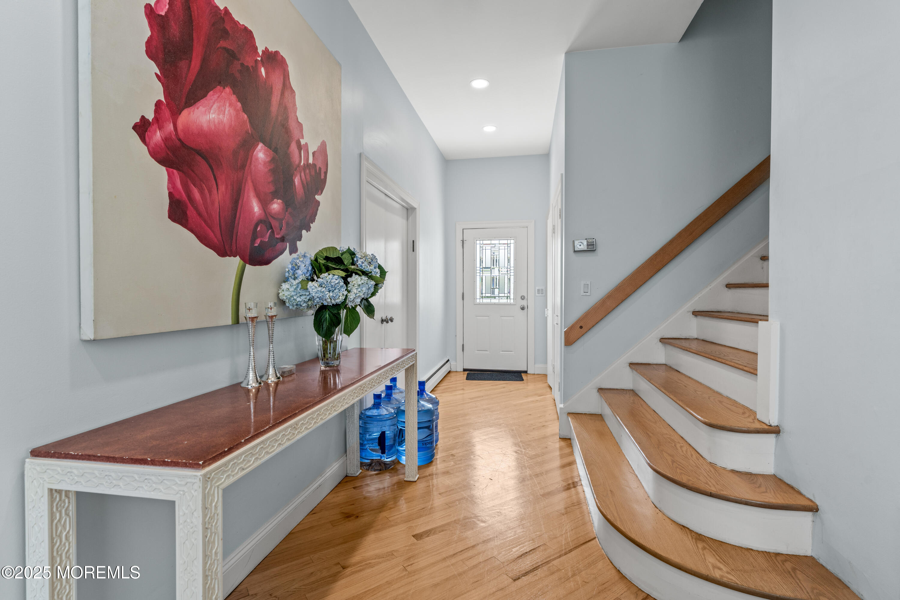 460 Runyan Avenue Deal, NJ 07723 - Photo 6 of 30 a view of entryway and hall with wooden floor