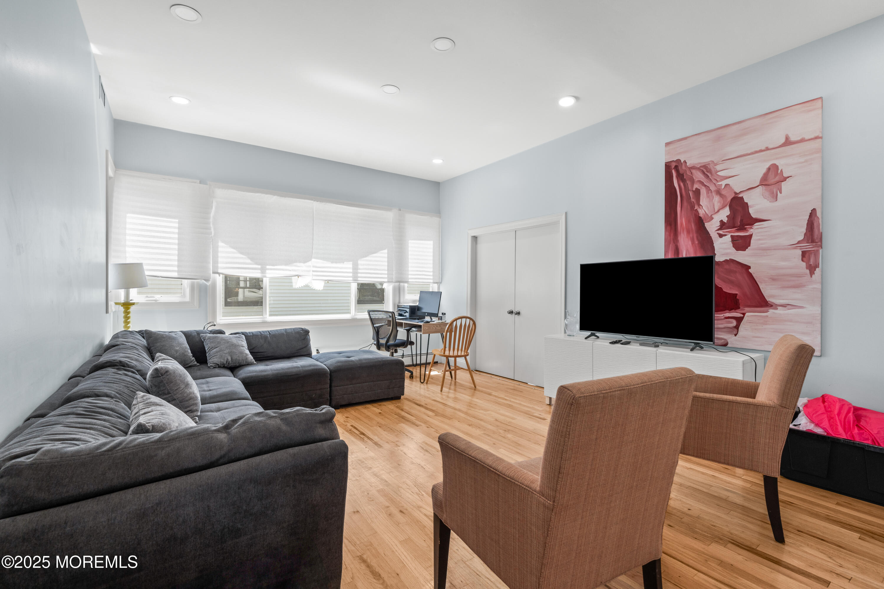 460 Runyan Avenue Deal, NJ 07723 - Photo 8 of 30 a living room with furniture and a flat screen tv