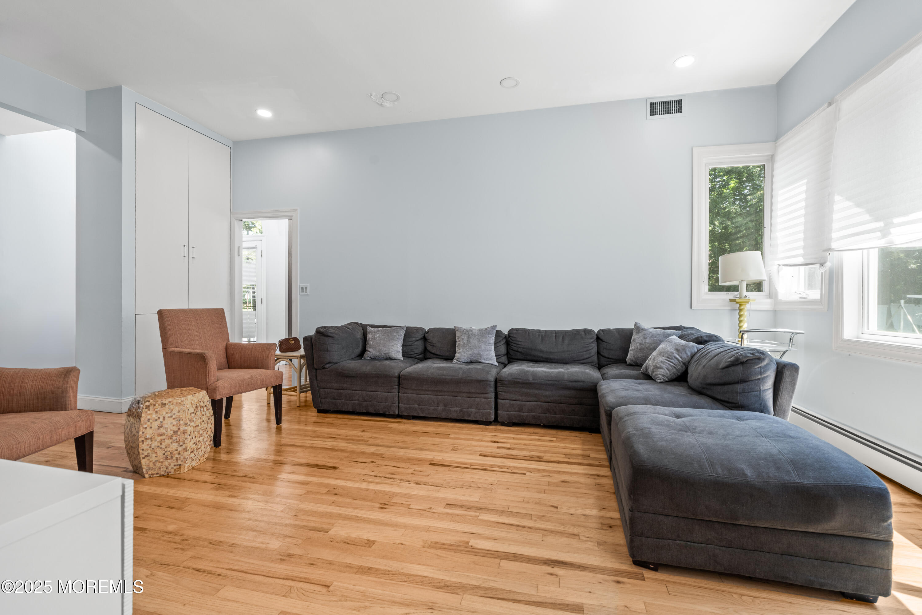 460 Runyan Avenue Deal, NJ 07723 - Photo 9 of 30 a living room with furniture and wooden floor