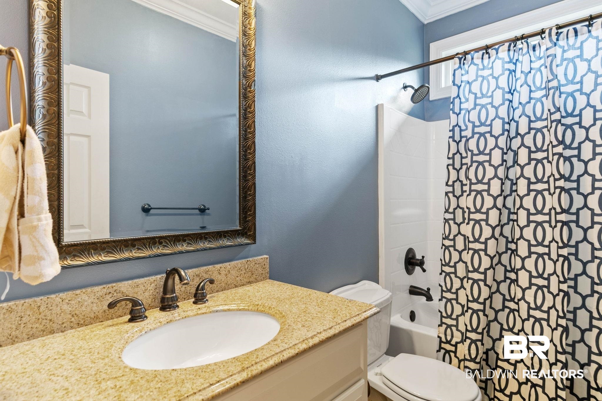 3668 Claridge Road North Mobile, AL 36608 - Photo 63 of 100 Bathroom with vanity, ornamental molding, and shower / tub combo with curtain