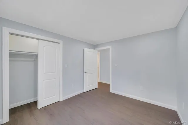 a bathroom with a double vanity sink and mirror