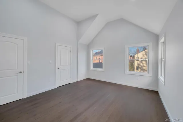 a view of a room that has a window in it