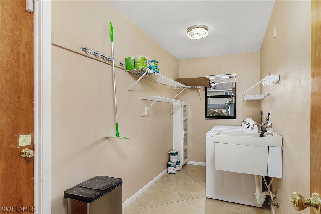 17516 Ingram Road Fort Myers, FL 33967 - Photo 14 of 26 a room with storage and utility