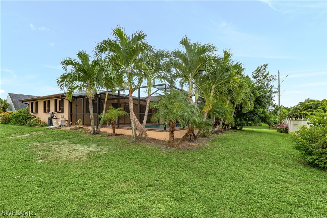 17516 Ingram Road Fort Myers, FL 33967 - Photo 21 of 26 a view of a house with a backyard