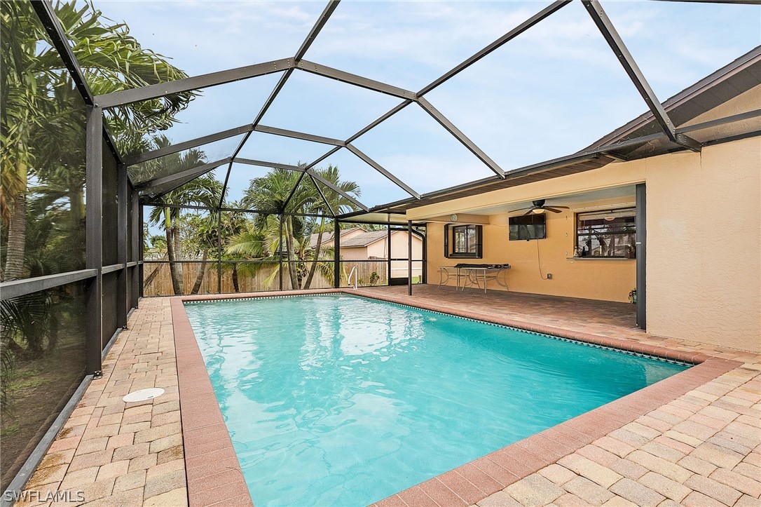 17516 Ingram Road Fort Myers, FL 33967 - Photo 4 of 26 a swimming pool with a yard