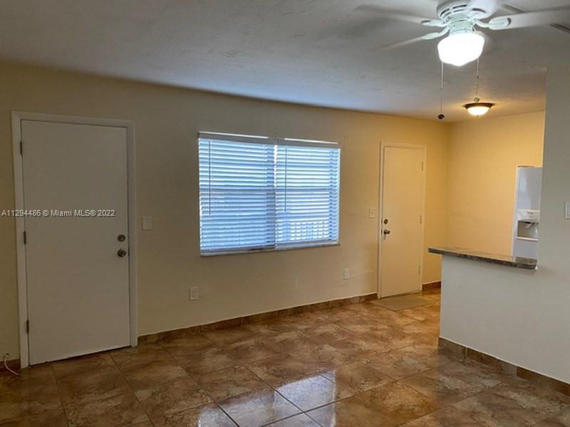 Glenvar Heights Miami, FL 33155 - Photo 6 of 12 a view of an empty room with a window