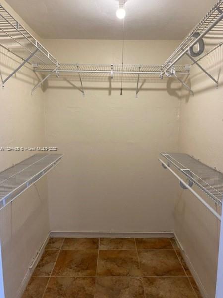 Glenvar Heights Miami, FL 33155 - Photo 9 of 12 a view of a room with racks on the wall