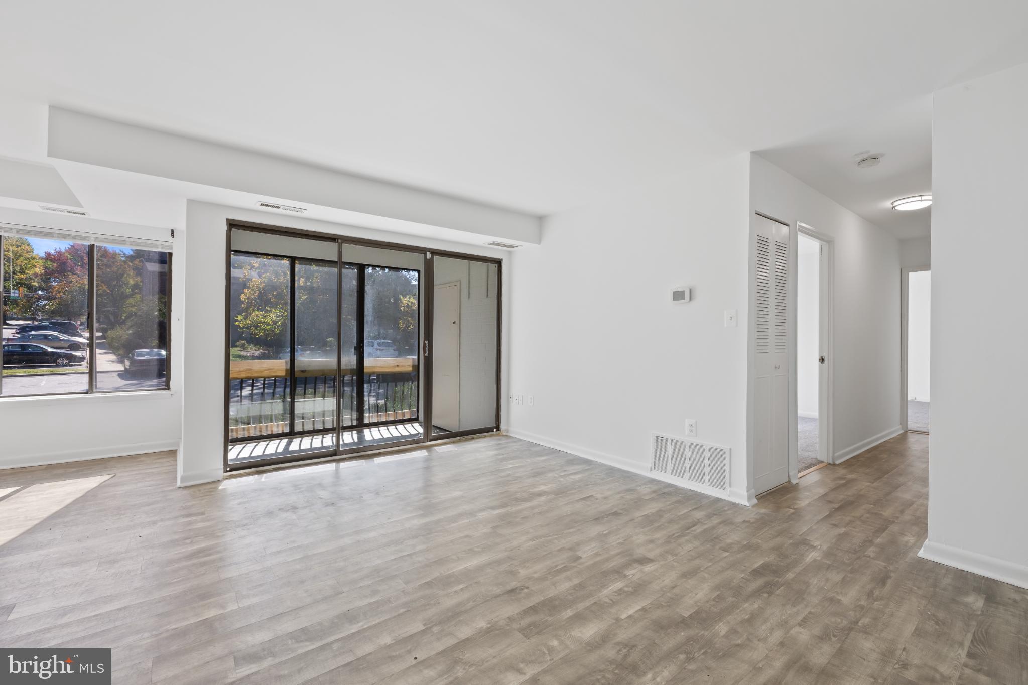 10572 Twin Rivers Road, Unit D1 Columbia, MD 21044 - Photo 11 of 24 Bright and airy open living space.