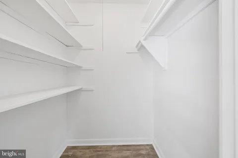 a view of small space with racks on the wall