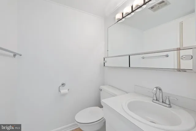 a bathroom with a sink and toilet