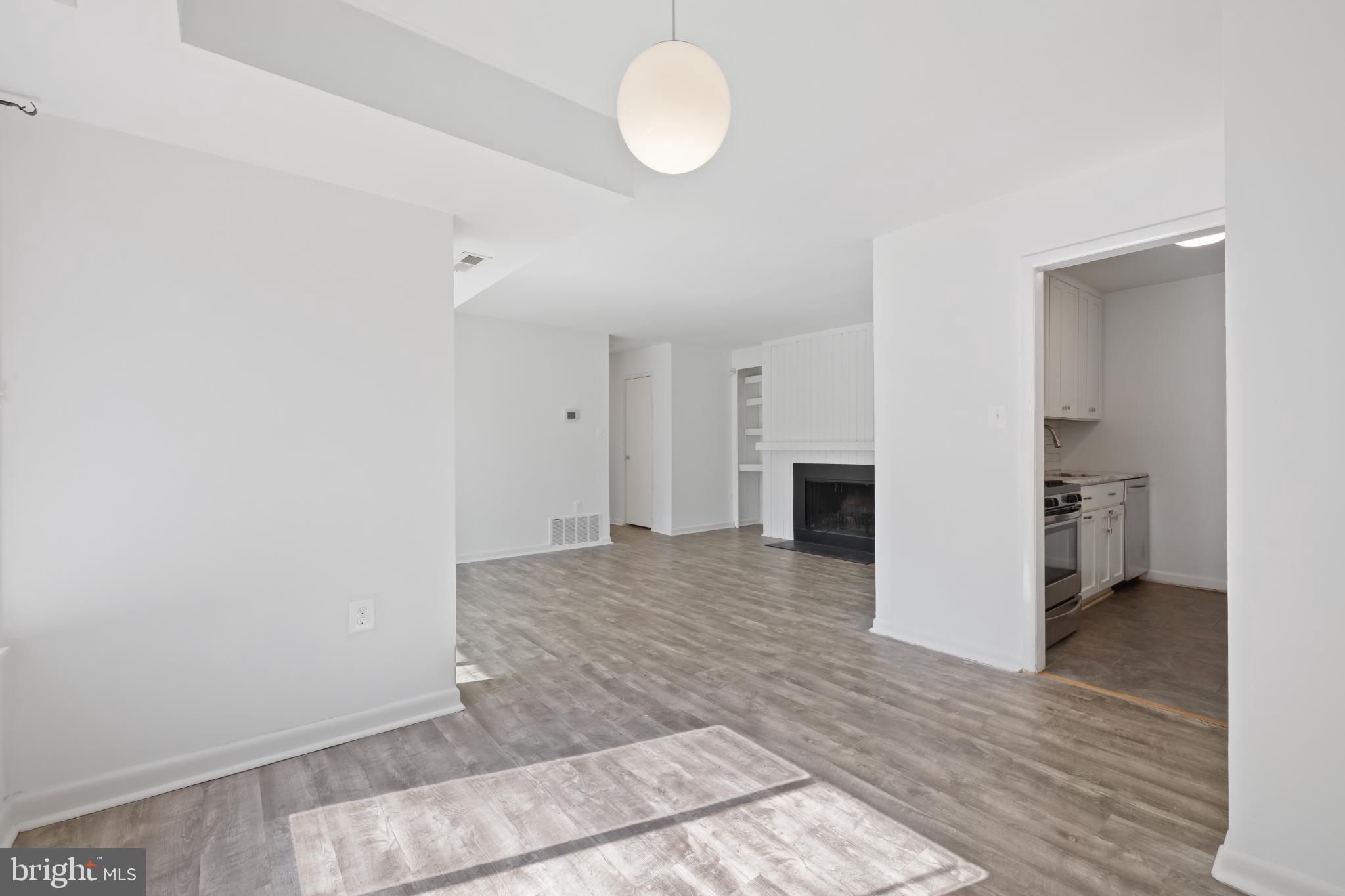 10572 Twin Rivers Road, Unit D1 Columbia, MD 21044 - Photo 4 of 24 Bright and airy open living space.