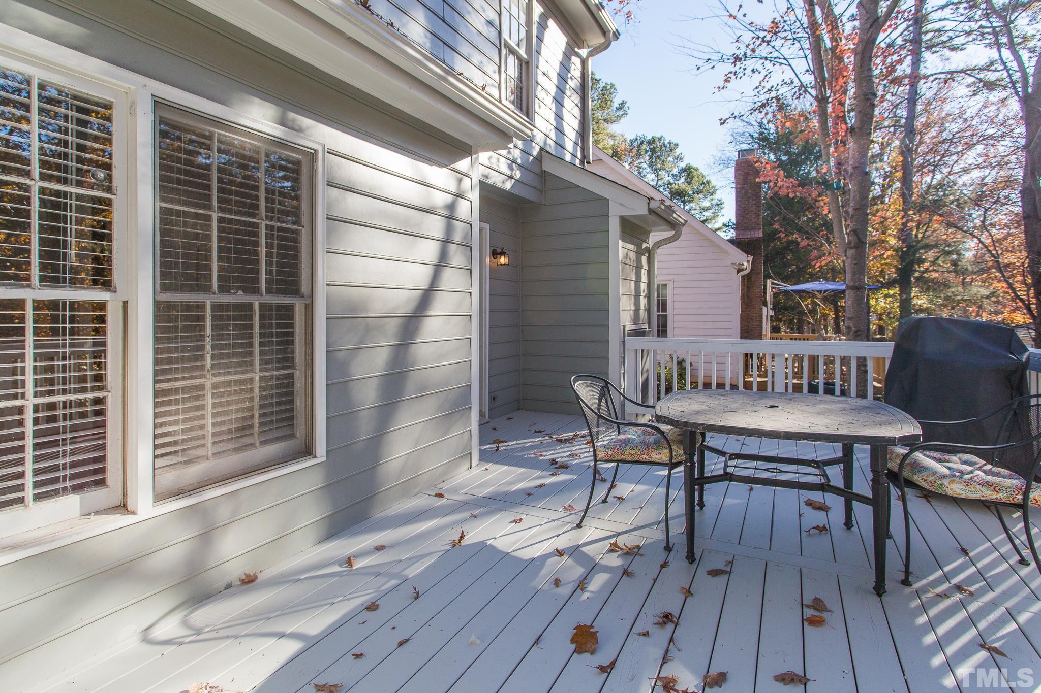 7013 Sandringham Drive Raleigh, NC 27613 - Photo 19 of 25 a deck view with a seating space
