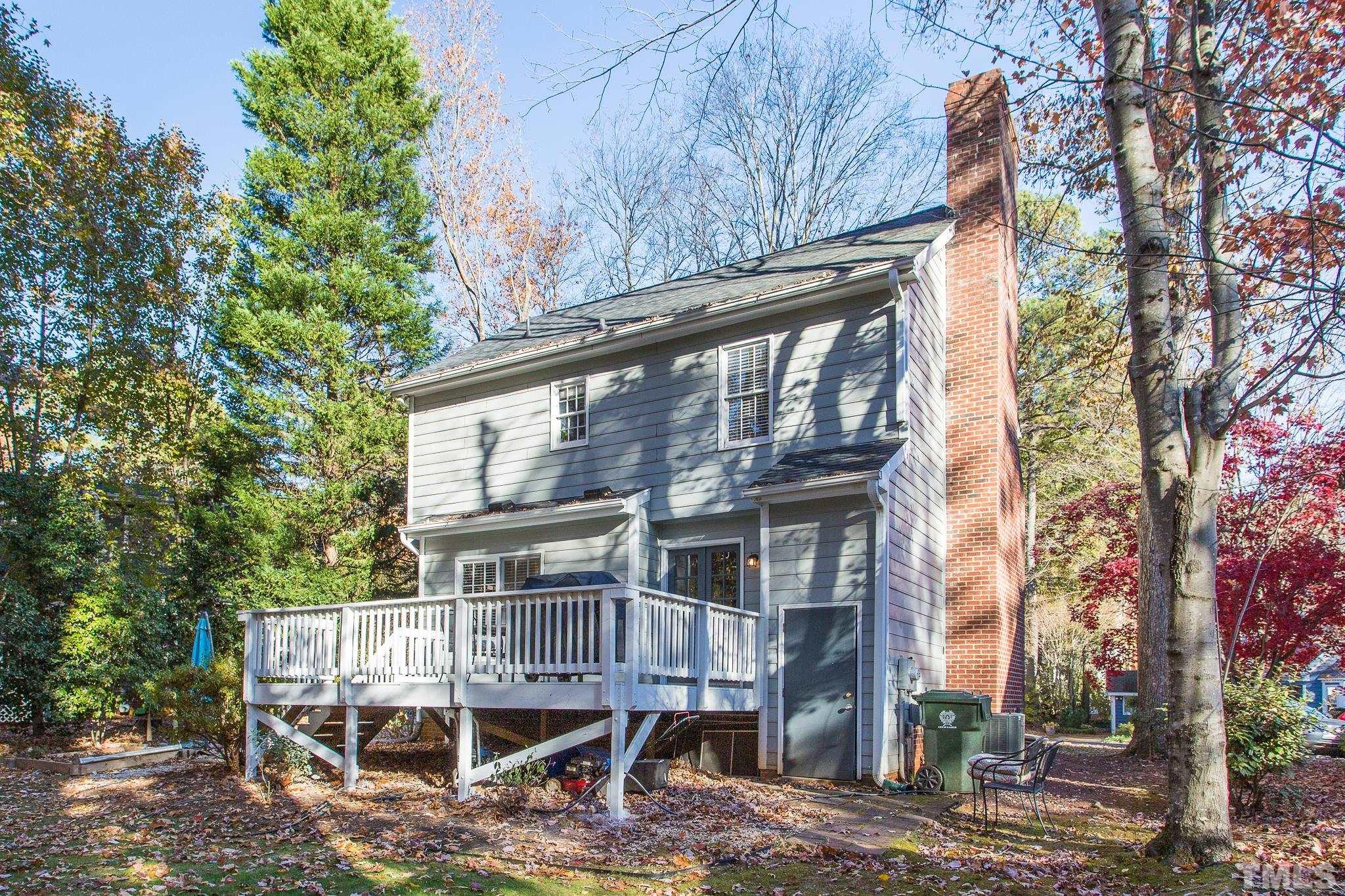 7013 Sandringham Drive Raleigh, NC 27613 - Photo 24 of 25 a view of a house with a iron stairs