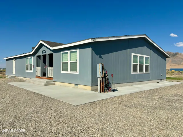 a front view of a house with yard