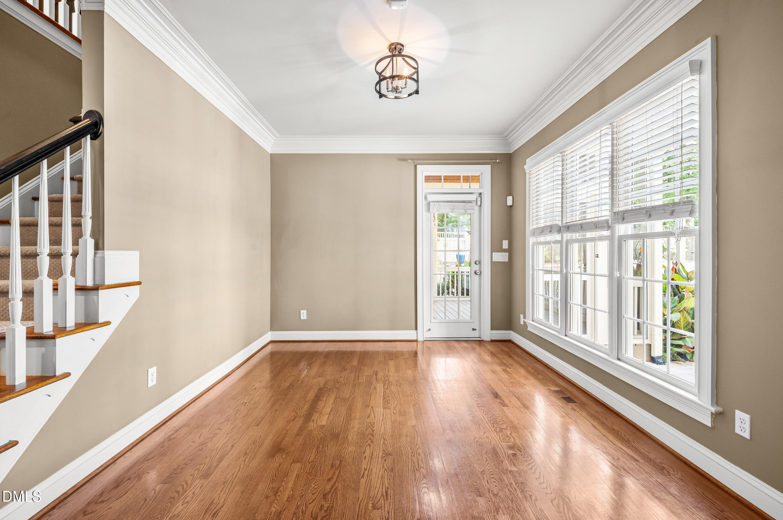 3821 Falls River Avenue Raleigh, NC 27614 - Photo 22 of 76 Sun room or casual dining looking to rear yard and porch