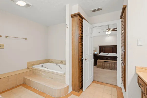 a bathroom with a bathtub sink and toilet