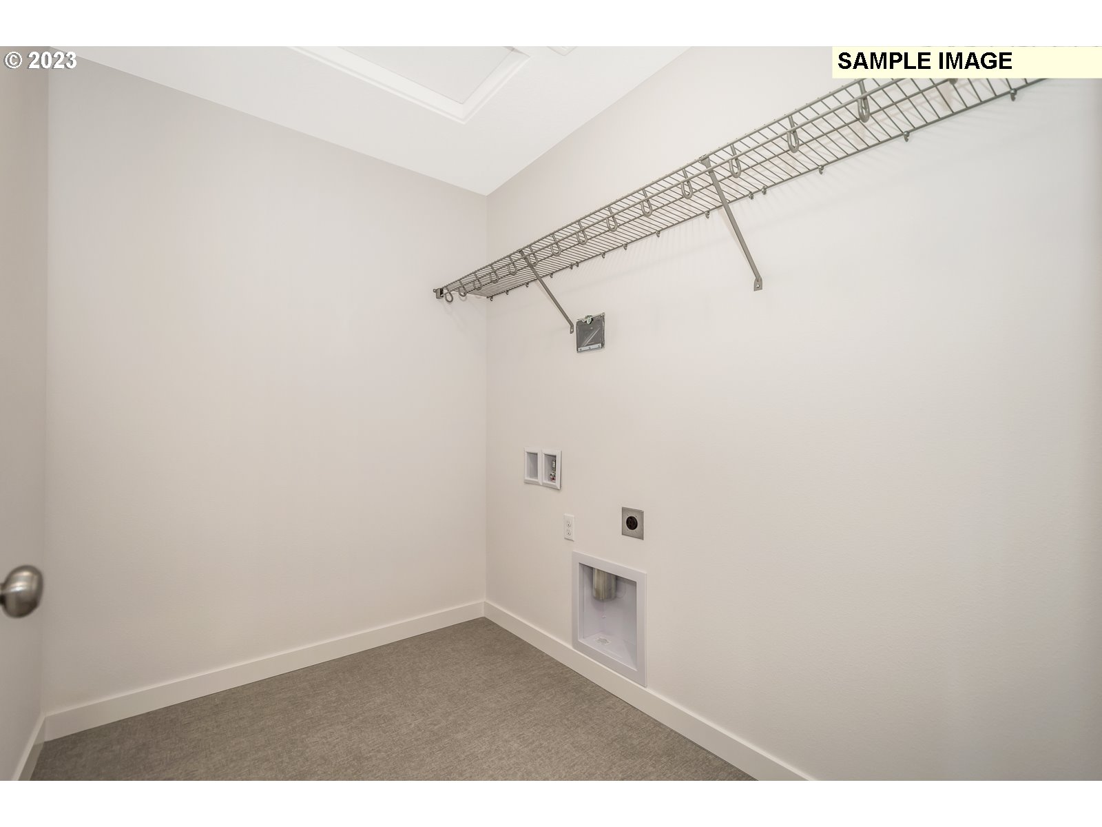 217 South 87th, Unit 46 Ridgefield, WA 98642 - Photo 23 of 24 a view of a room with racks on the wall