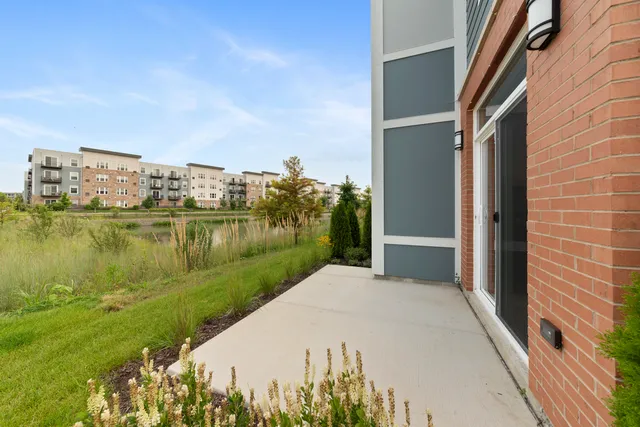 a view of a lake with a building in front of it