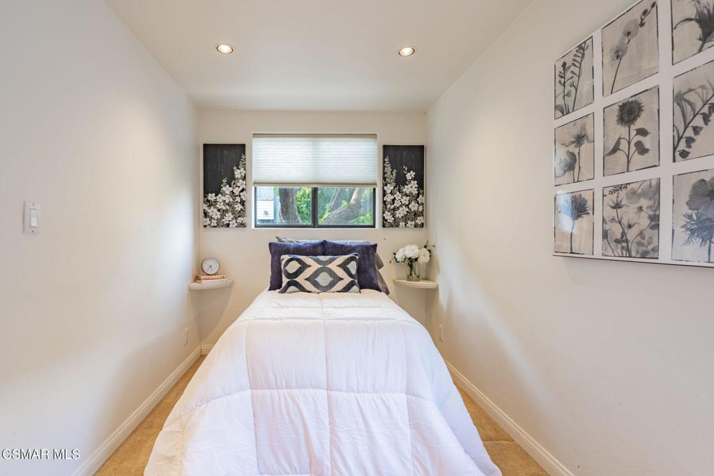 6078 Peppertree Lane Simi Valley, CA 93063 - Photo 22 of 59 a bedroom with a bed and a window