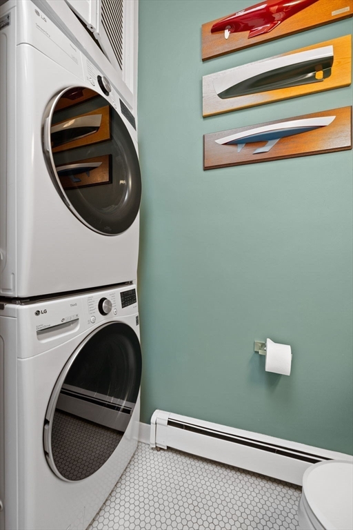 1778 Beacon Street, Unit 302 Brookline, MA 02445 - Photo 11 of 18 a utility room with dryer and washer