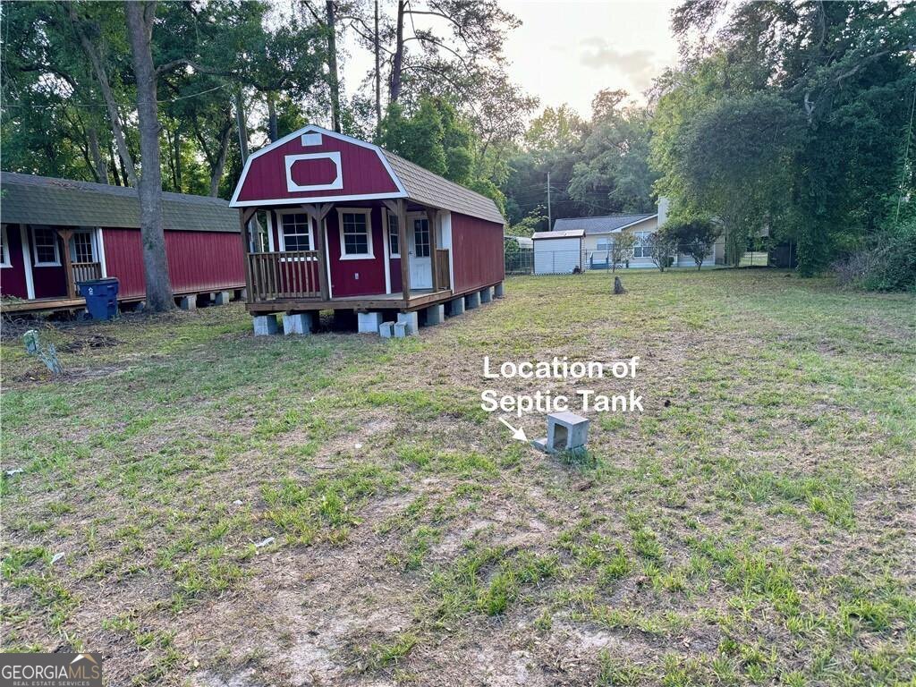 41 Middle Road Hortense, GA 31543 - Photo 19 of 22 a view of a house with a yard