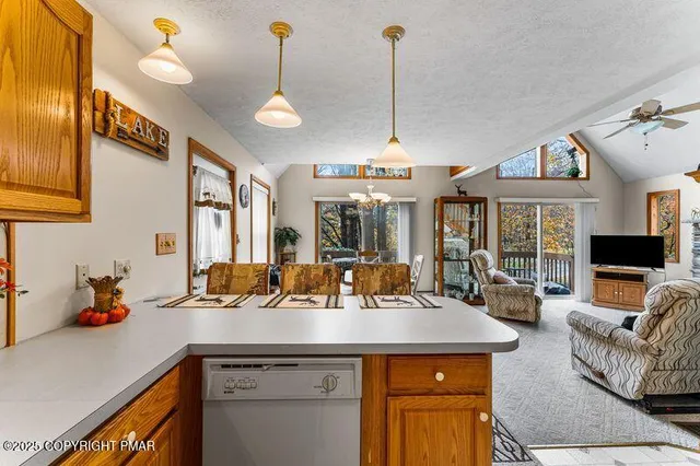 a view of a center island and living room furniture