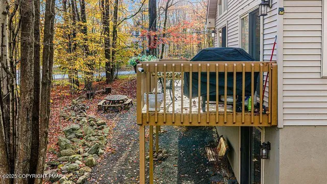 a view of a brick house with a large window