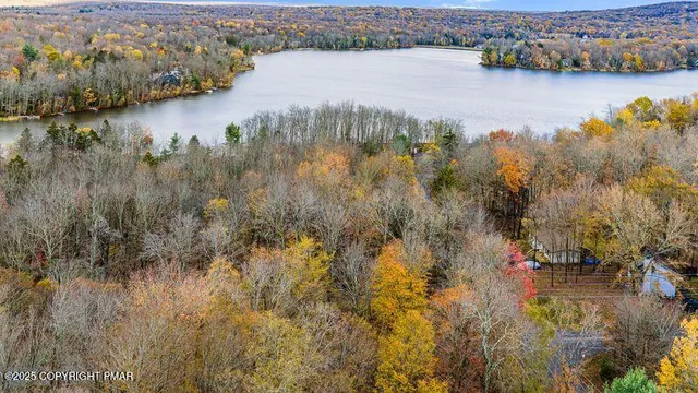 a view of lake with mountain