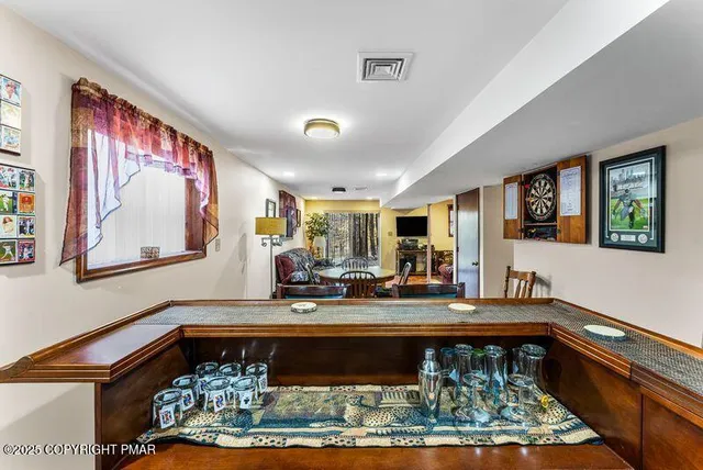 a view of a patio with chair and dining table