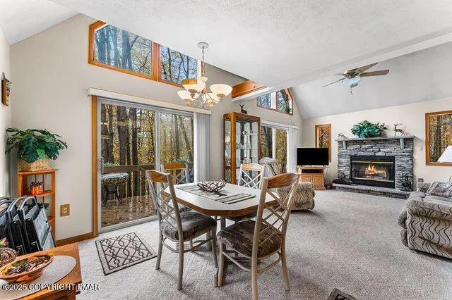 a view of a livingroom with furniture and a fireplace