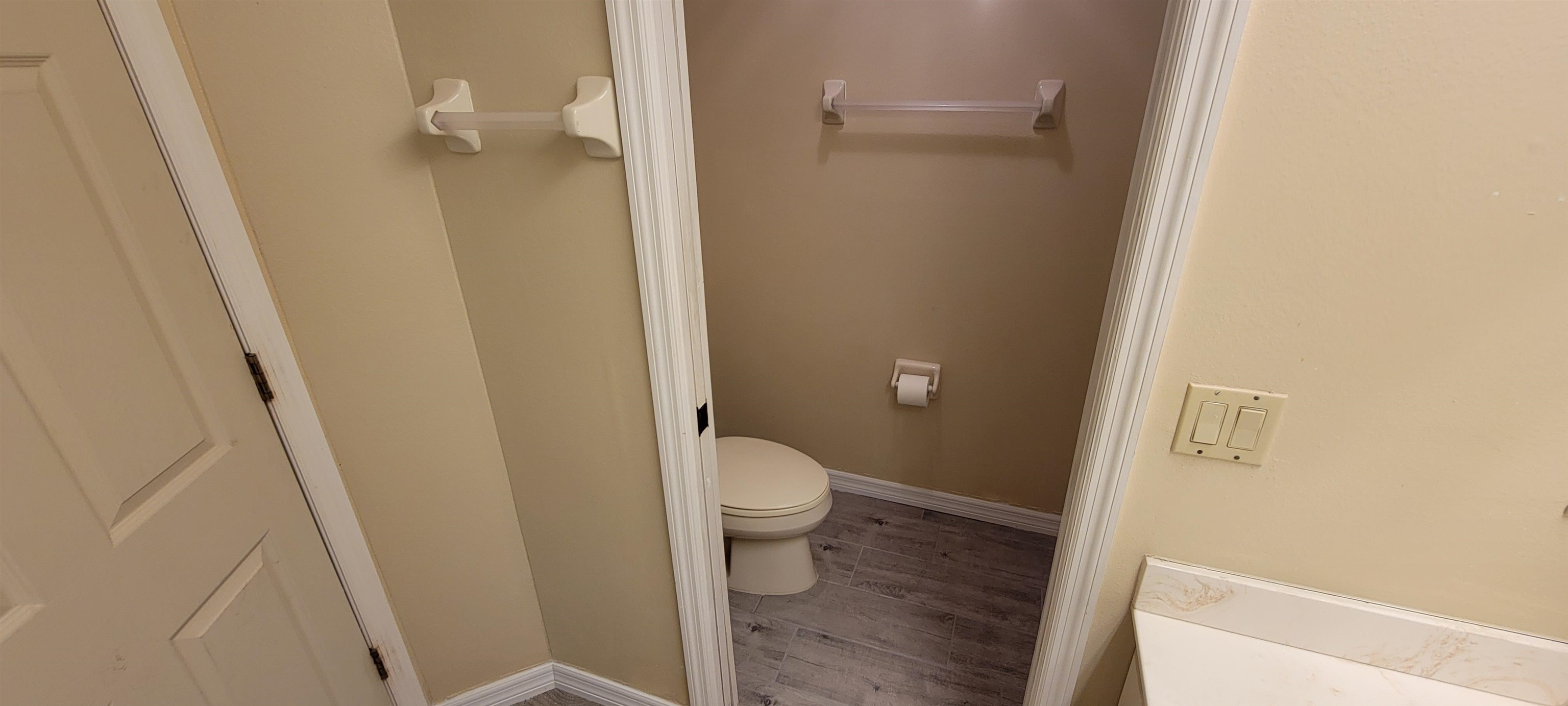 305 Raintree Trail St. Augustine, FL 32086 - Photo 15 of 19 a bathroom with a granite countertop shower and a toilet
