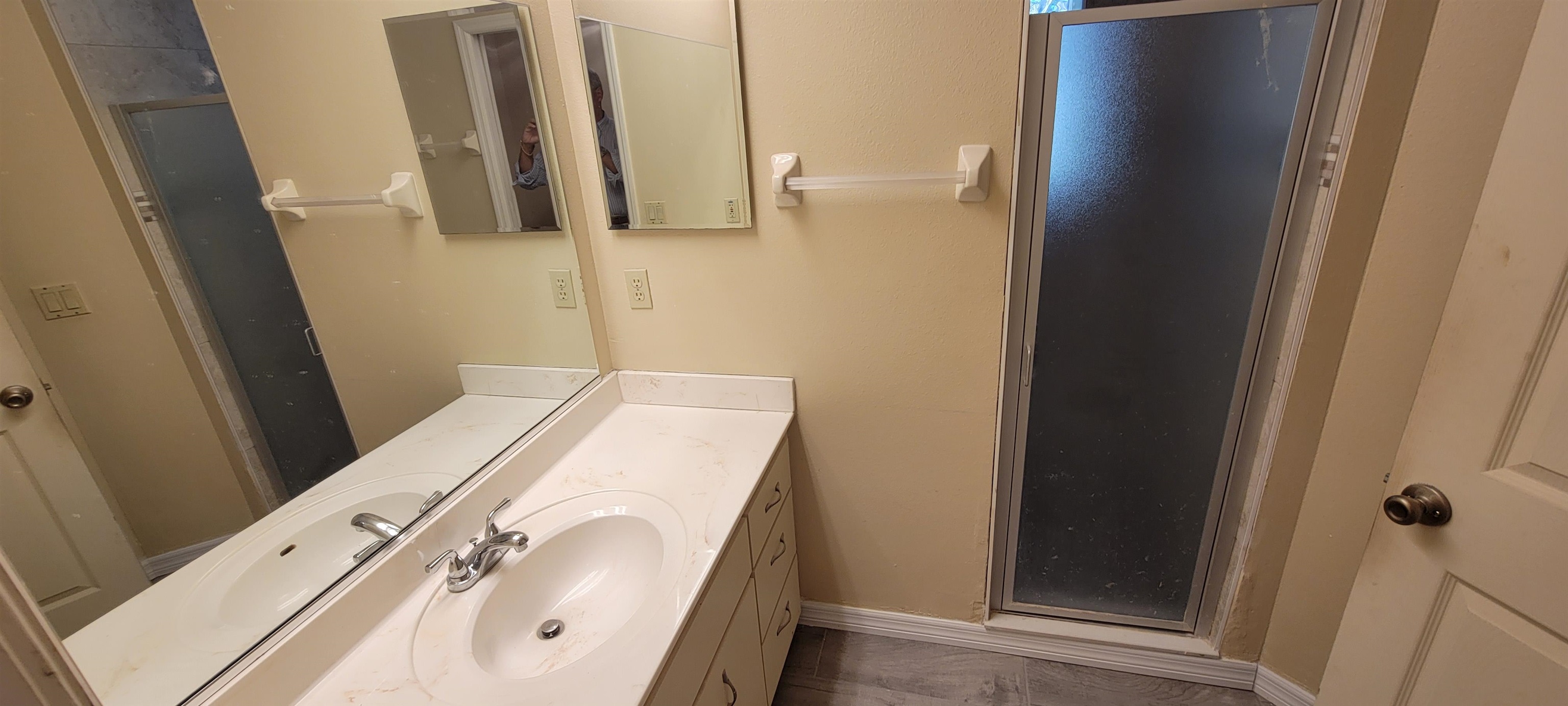 305 Raintree Trail St. Augustine, FL 32086 - Photo 16 of 19 a bathroom with a sink and mirror