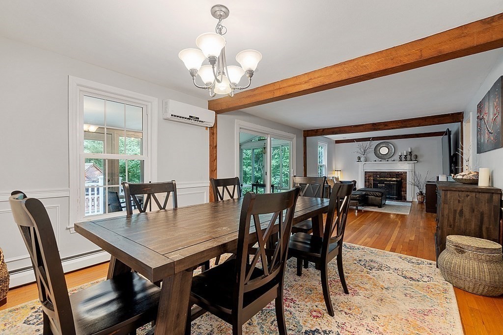 473 Main Street Boxford, MA 01921 - Photo 13 of 42 a view of a dining room with furniture window and wooden floor