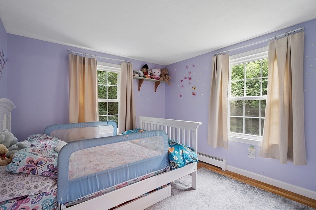 473 Main Street Boxford, MA 01921 - Photo 25 of 42 a bedroom with a bed and a window