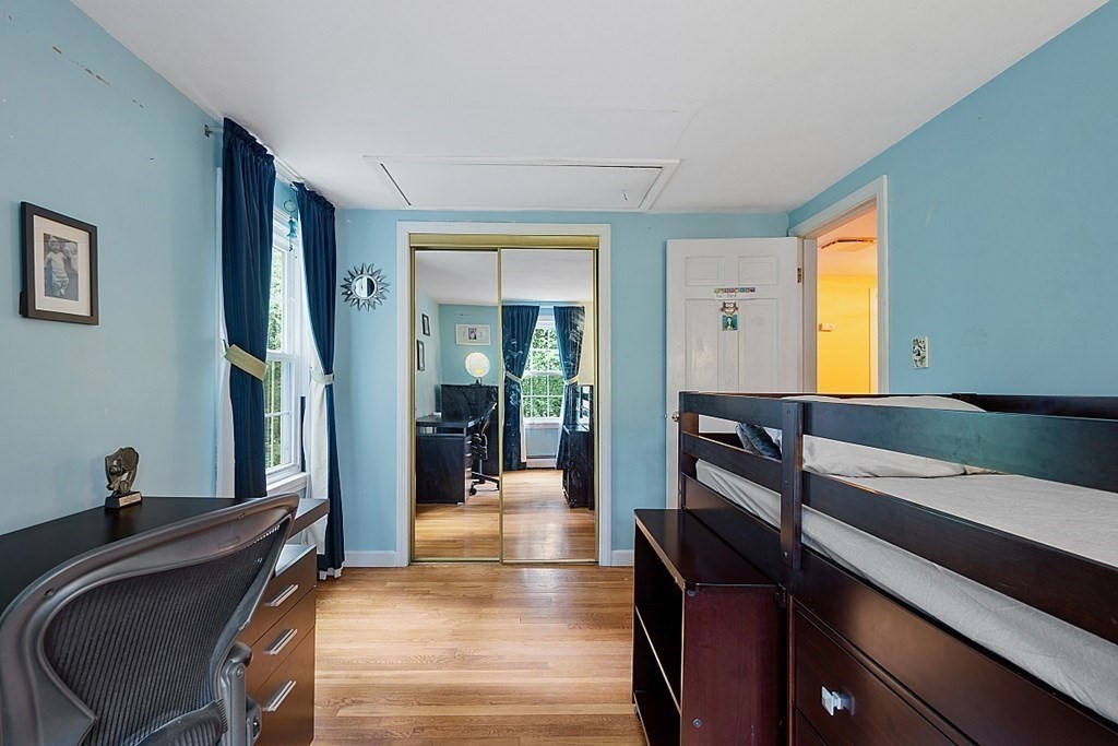 473 Main Street Boxford, MA 01921 - Photo 27 of 42 a hallway with a large window and a mirror