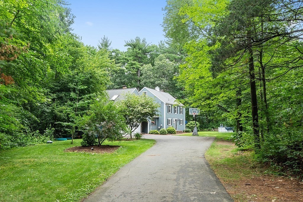473 Main Street Boxford, MA 01921 - Photo 35 of 42 a view of house with tall trees