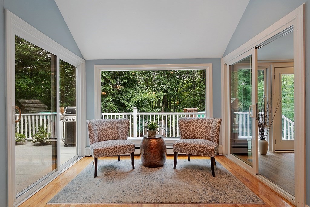 473 Main Street Boxford, MA 01921 - Photo 5 of 42 a living room with furniture and a table with wooden floor