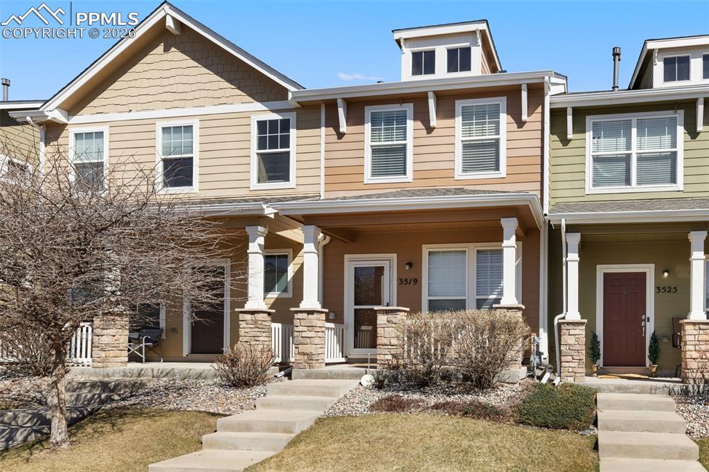 3519 Grey Owl Point Colorado Springs, CO 80916 - Photo 2 of 29 Craftsman-style home with covered porch
