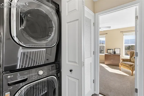 a view of living room with washer and dryer