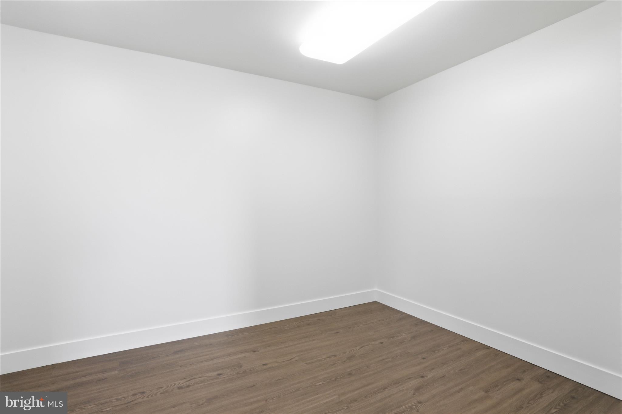 604 Locksa Road Romney, WV 26757 - Photo 25 of 48 a view of an empty room with wooden floor