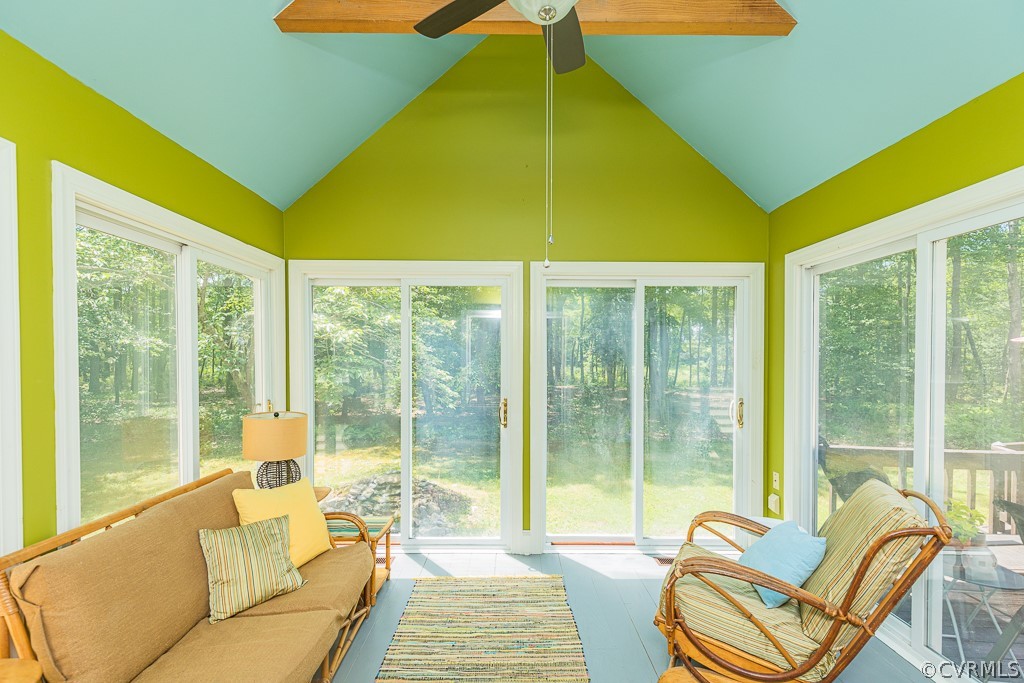 3433 Hales Point Road Farnham, VA 22460 - Photo 14 of 32 a living room with a bed and a large window