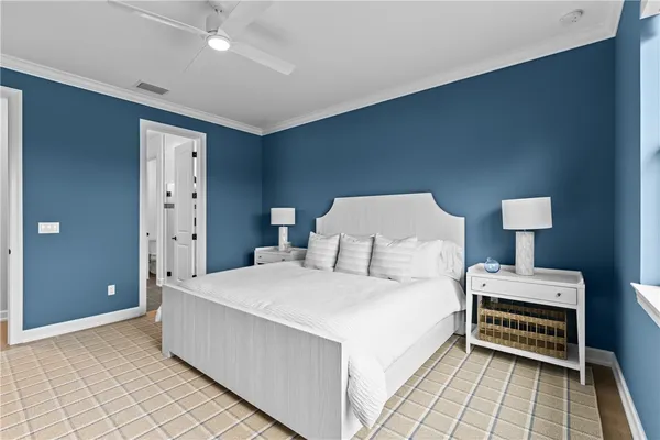 a large white bed in a white room