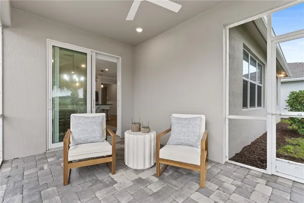 a outdoor living space with furniture and a window