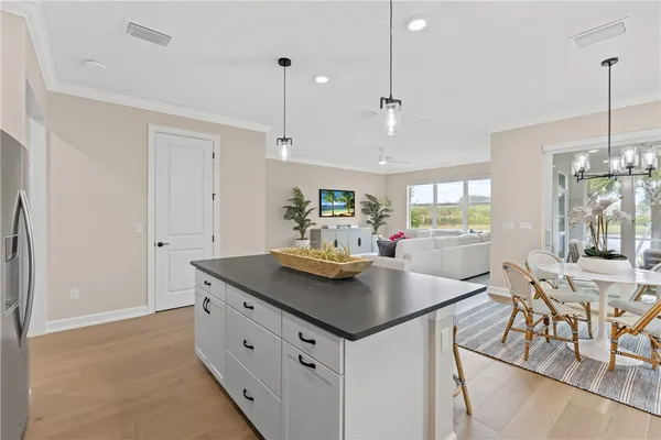 a view of kitchen island with stainless steel appliances