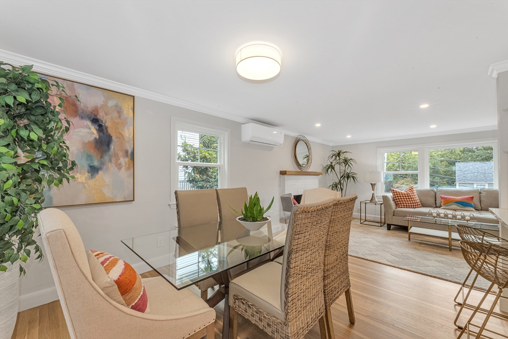 26 Crehore Road Boston, MA 02467 - Photo 13 of 33 a living room with furniture and a large window