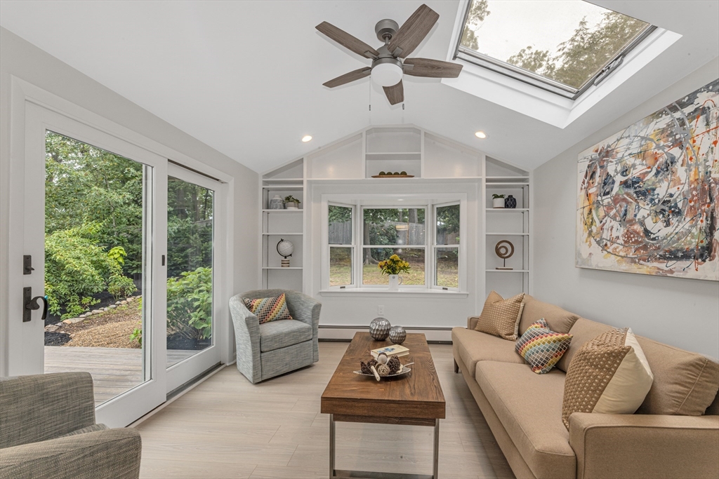 26 Crehore Road Boston, MA 02467 - Photo 14 of 33 a living room with furniture and a large window