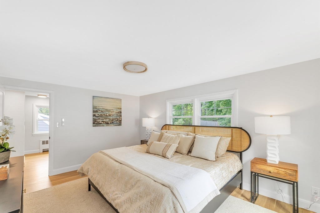 26 Crehore Road Boston, MA 02467 - Photo 16 of 33 a bedroom with a bed and window