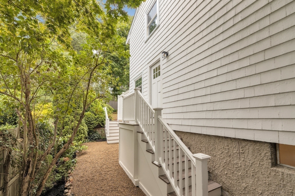 26 Crehore Road Boston, MA 02467 - Photo 28 of 33 a view of a pathway with a house