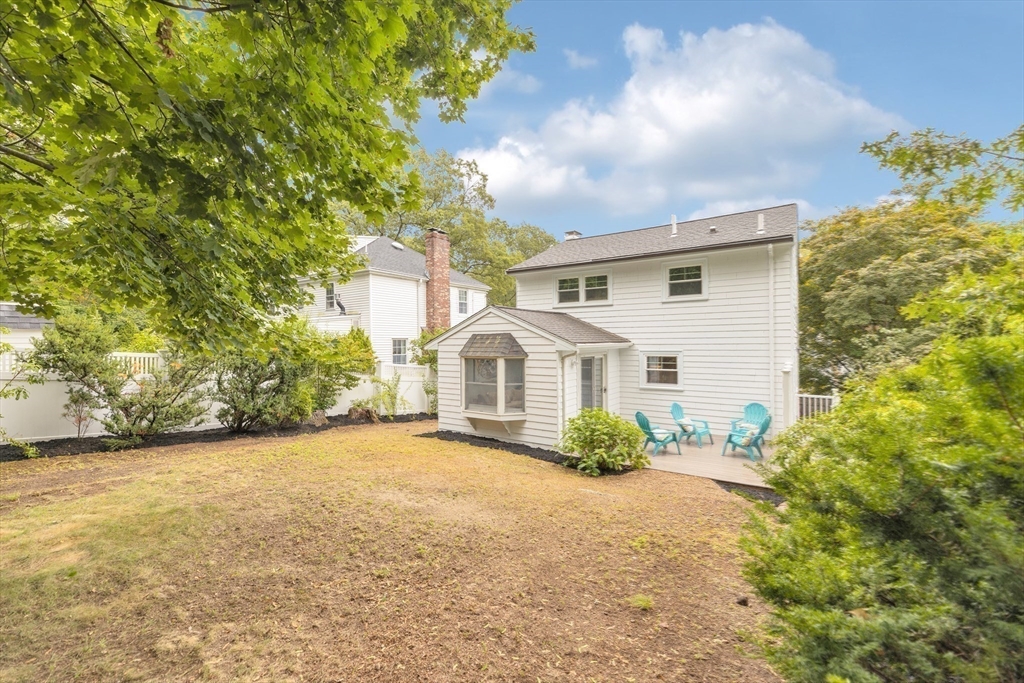 26 Crehore Road Boston, MA 02467 - Photo 29 of 33 a front view of a house with garden